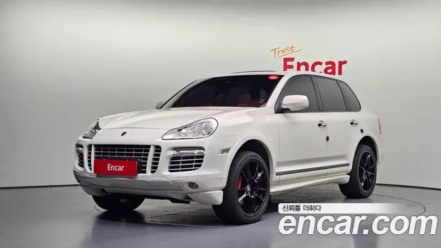 Porsche Cayenne 2010 — photo 1