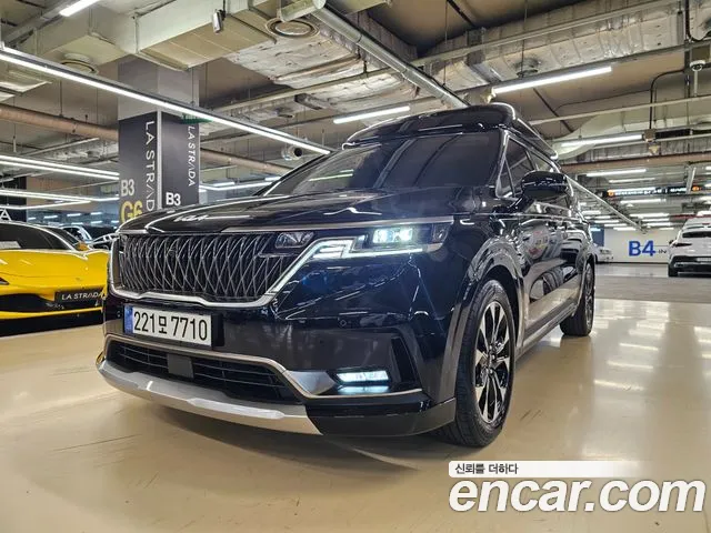 Kia Canival 2023 — photo 1