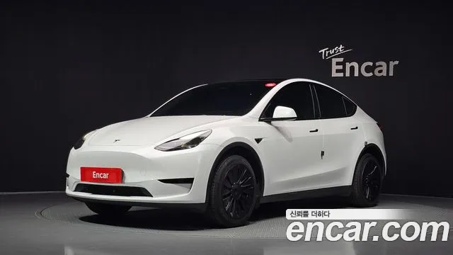 Tesla Model Y 2023 — photo 1