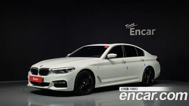 BMW 5-Series 2018 — photo 1
