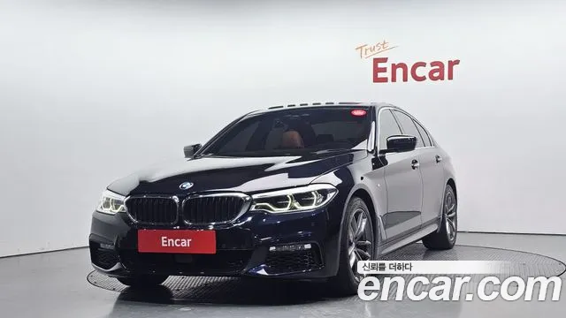 BMW 5-Series 2018 — photo 1