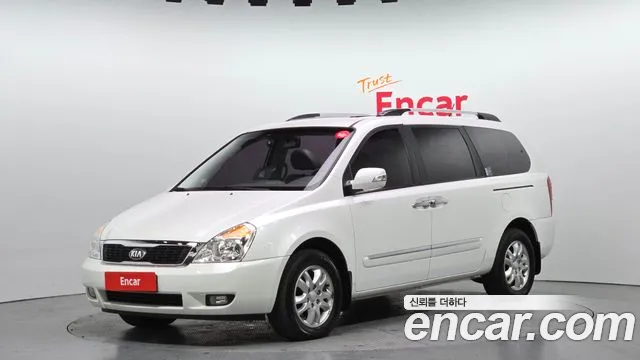 Kia Canival 2013 — photo 1