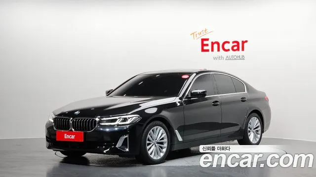 BMW 5-Series 2023 — photo 1