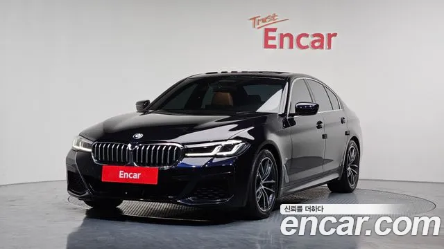 BMW 5-Series 2022 — photo 1