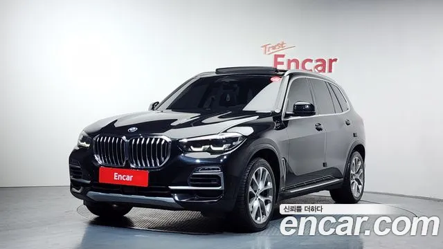BMW X5 2021 — photo 1