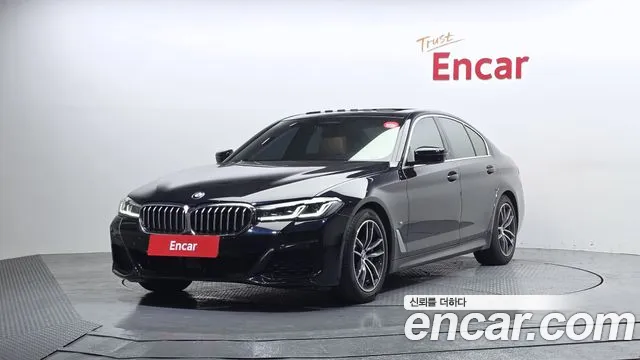 BMW 5-Series 2021 — photo 1