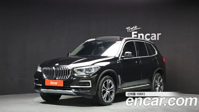BMW X5 2022 — photo 1