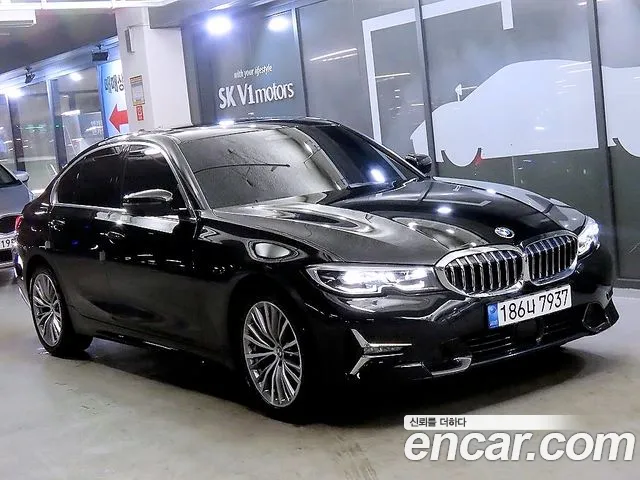 BMW 3-Series 2022 — photo 1