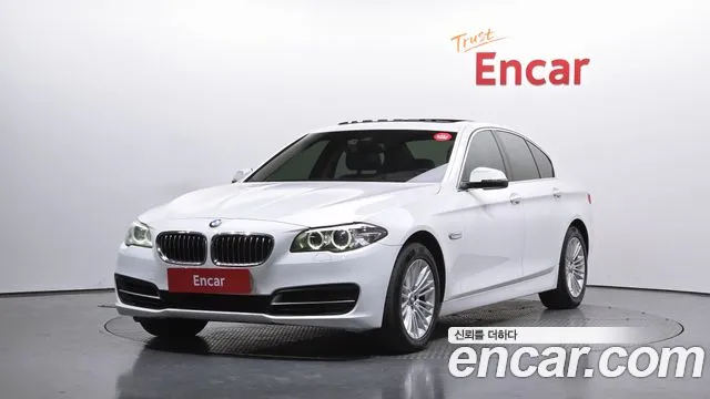 BMW 5-Series 2014 — photo 1