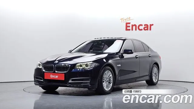 BMW 5-Series 2014 — photo 1