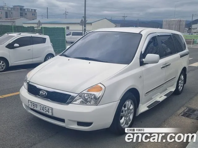 Kia Canival 2009 — photo 1