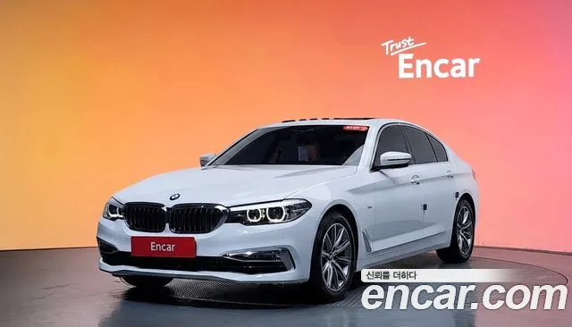 BMW 5-Series 2018 — photo 1