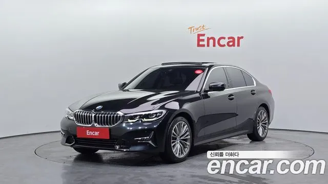 BMW 3-Series 2022 — photo 1