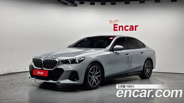 BMW 5-Series 2024 — photo 1
