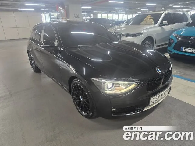 BMW 1-Series 2013 — photo 1