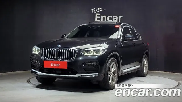 BMW X4 2021 — photo 1