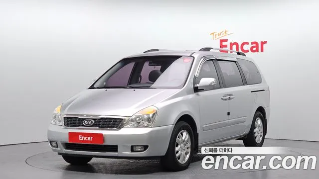 Kia Canival 2012 — photo 1