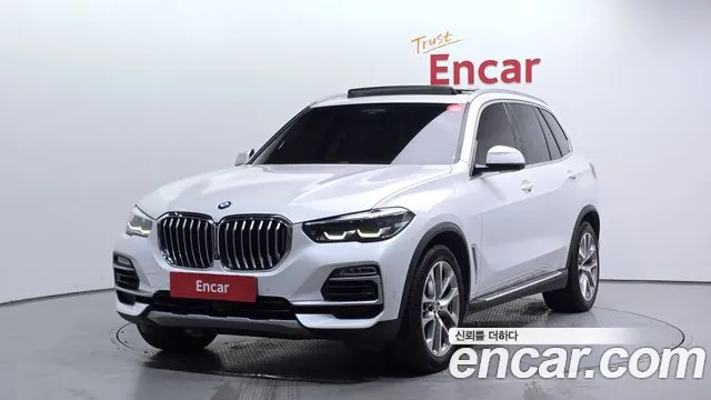 BMW X5 2021 — photo 1