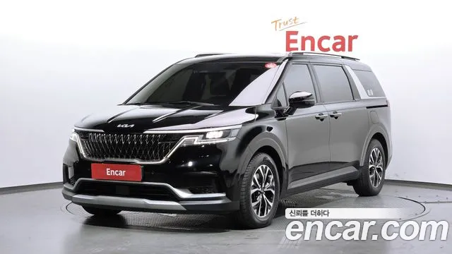 Kia Canival 2023 — photo 1