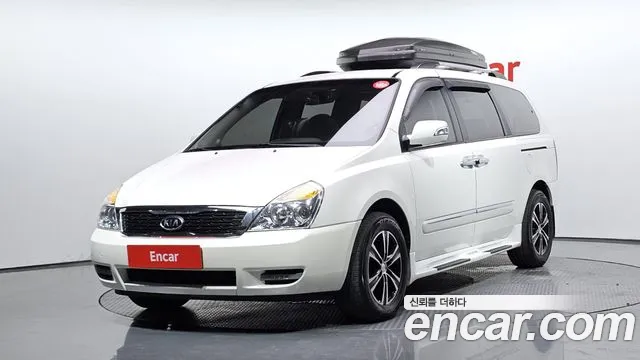 Kia Canival 2011 — photo 1