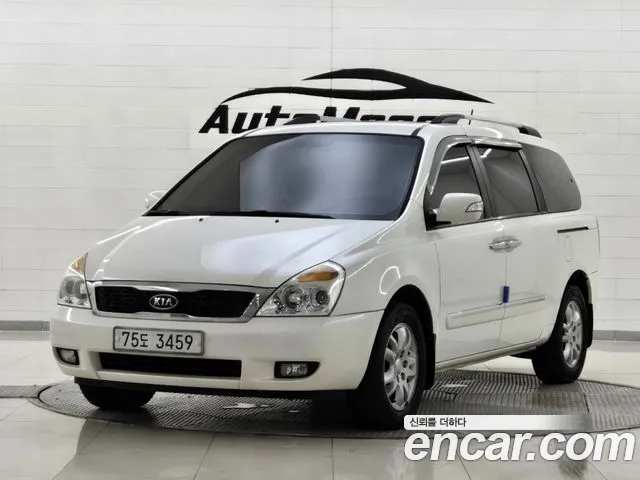 Kia Canival 2011 — photo 1