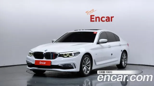 BMW 5-Series 2018 — photo 1