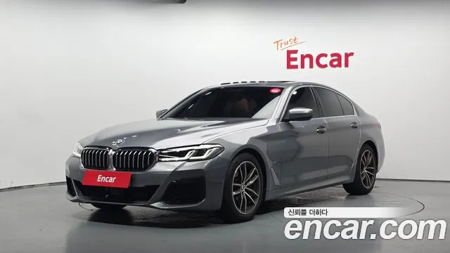 BMW 5-Series 2023 — photo 1