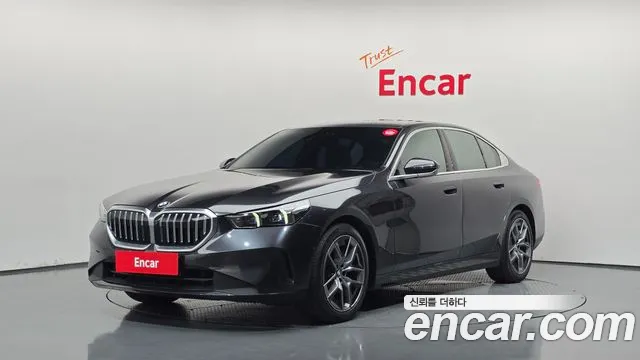 BMW 5-Series 2024 — photo 1