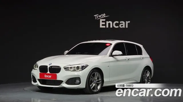 BMW 1-Series 2018 — photo 1