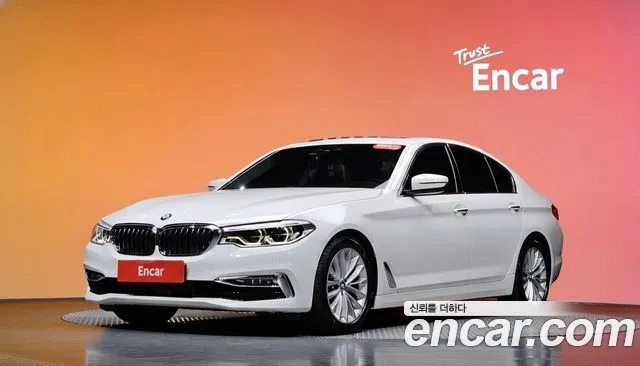 BMW 5-Series 2018 — photo 1