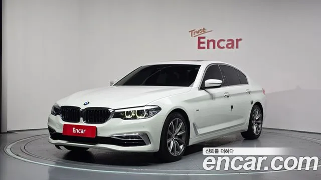 BMW 5-Series 2018 — photo 1