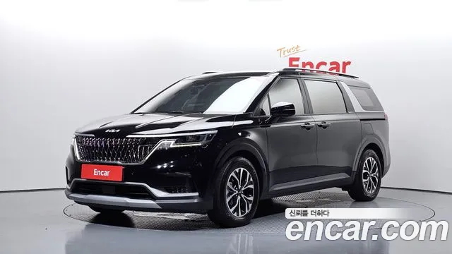 Kia Canival 2023 — photo 1