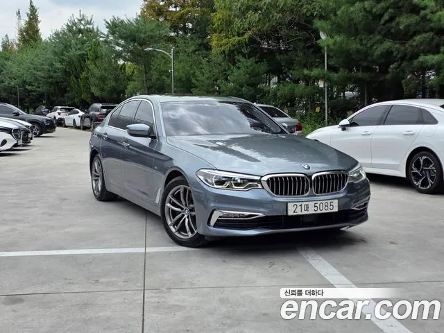 BMW 5-Series 2018 — photo 1