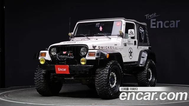 Jeep Wrangler 1998 — photo 1