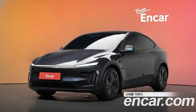 Tesla Model Y 2025 — photo 1