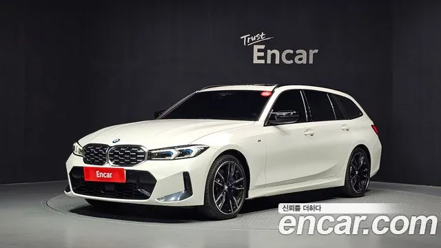 BMW 3-Series 2023 — photo 1