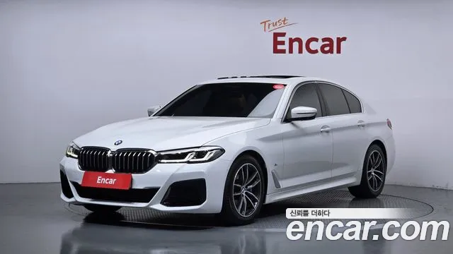BMW 5-Series 2023 — photo 1