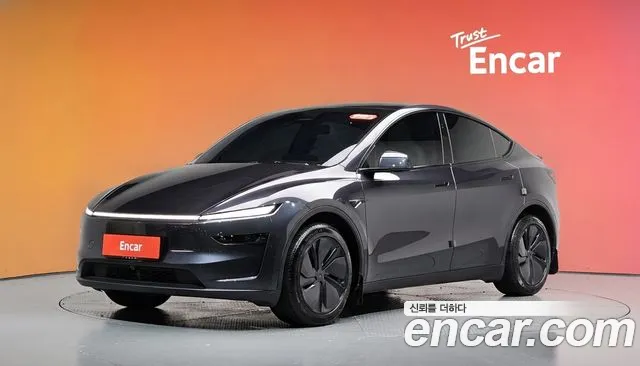 Tesla Model Y 2025 — photo 1