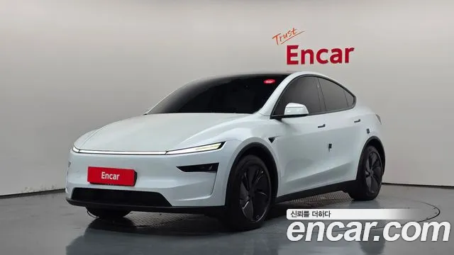 Tesla Model Y 2025 — photo 1