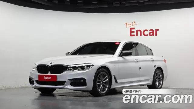 BMW 5-Series 2018 — photo 1