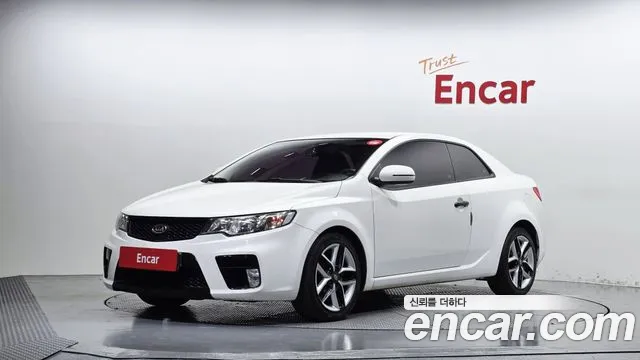Kia Porte 2012 — photo 1