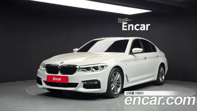 BMW 5-Series 2018 — photo 1