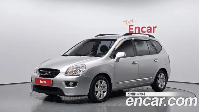 Kia Carens 2009 — photo 1