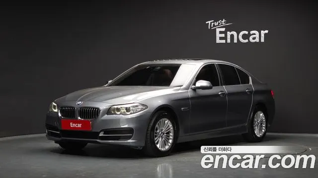 BMW 5-Series 2014 — photo 1