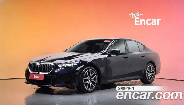 BMW 5-Series 2024 — photo 1