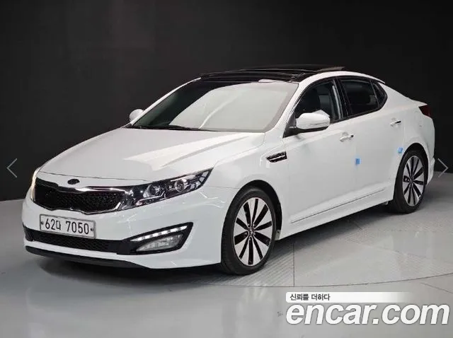 Kia K5 2011 — photo 1