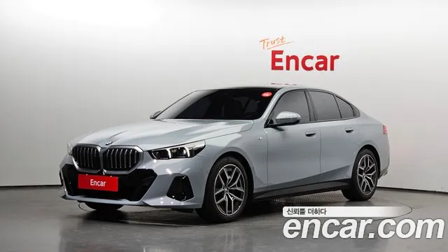 BMW 5-Series 2024 — photo 1