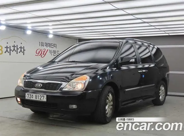 Kia Canival 2013 — photo 1