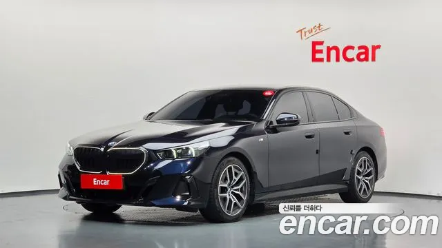 BMW 5-Series 2024 — photo 1
