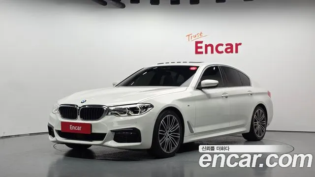 BMW 5-Series 2019 — photo 1